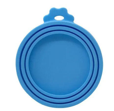 Silicone pet seal three-in-one can cover and spoon in sky blue on a pet food tin