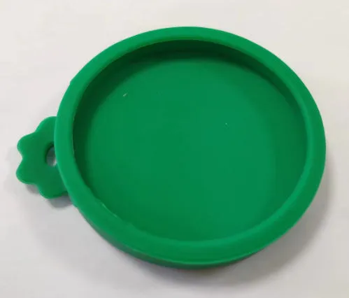 Silicone pet seal three-in-one can cover and spoon in sky blue on a pet food tin