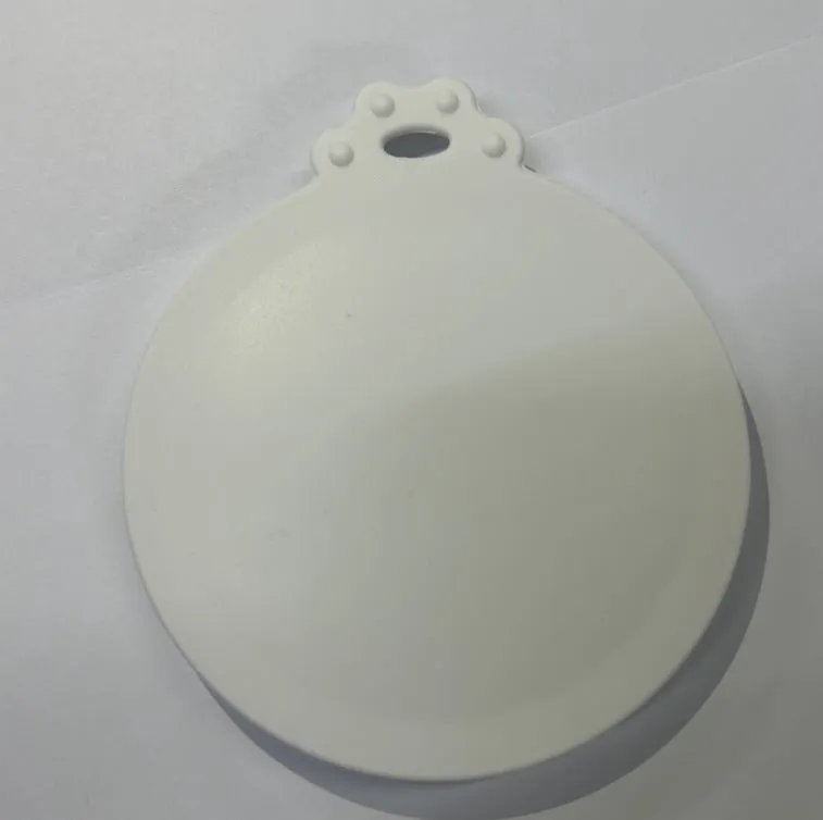 Silicone pet seal three-in-one can cover and spoon in sky blue on a pet food tin