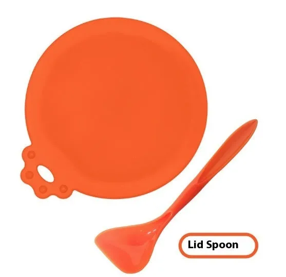 Silicone pet seal three-in-one can cover and spoon in sky blue on a pet food tin