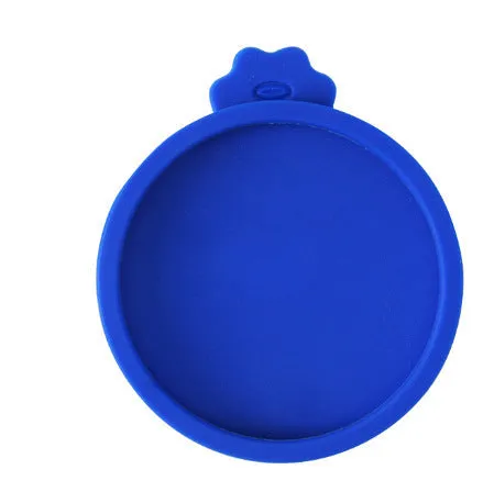 Silicone pet seal three-in-one can cover and spoon in sky blue on a pet food tin