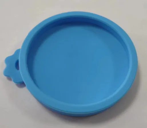 Silicone pet seal three-in-one can cover and spoon in sky blue on a pet food tin