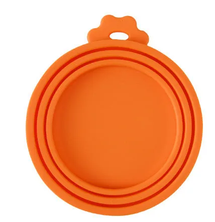 Silicone pet seal three-in-one can cover and spoon in sky blue on a pet food tin