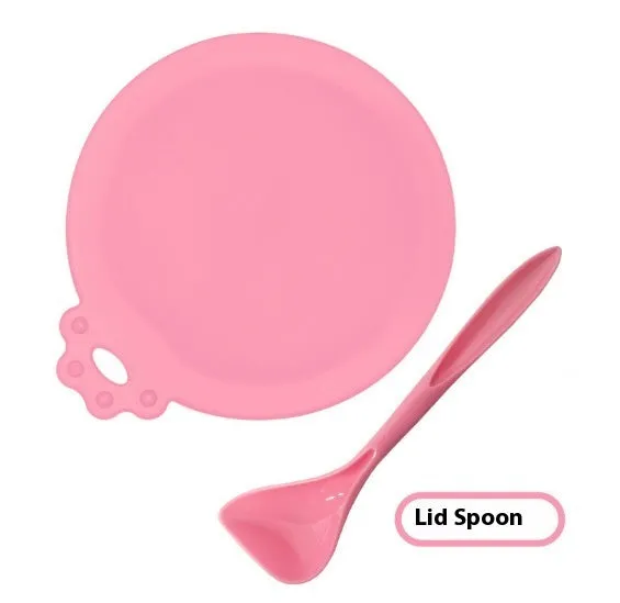 Silicone pet seal three-in-one can cover and spoon in sky blue on a pet food tin