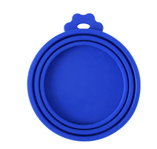 Silicone pet seal three-in-one can cover and spoon in sky blue on a pet food tin