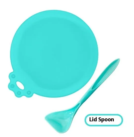 Silicone pet seal three-in-one can cover and spoon in sky blue on a pet food tin