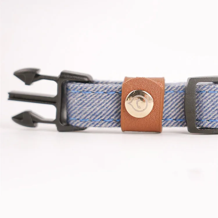 Adjustable mohair dog collar with nameplate and hand holding rope in cement gray