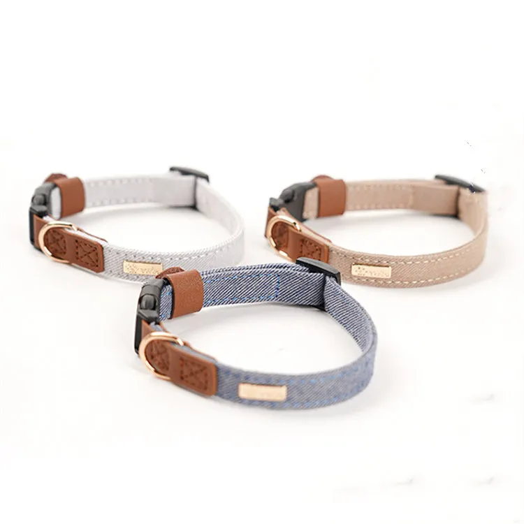 Adjustable mohair dog collar with nameplate and hand holding rope in cement gray