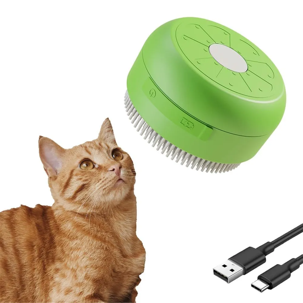 Green and yellow rechargeable silicone steam brush for grooming cats and dogs on a table.