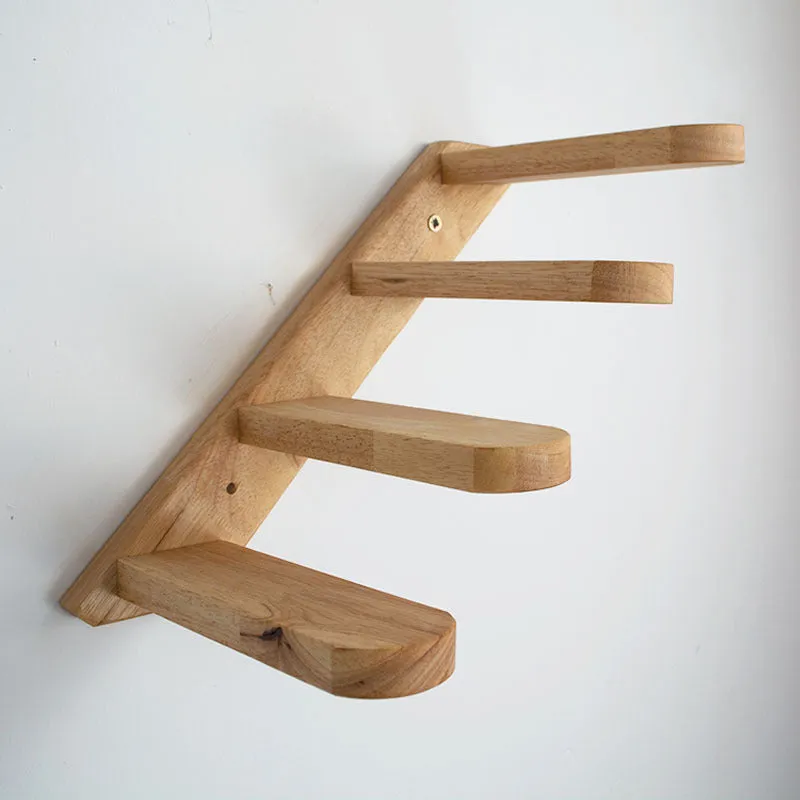 Wall-mounted solid wood cat stairs with 4 steps, left-to-right arrangement, on a white wall