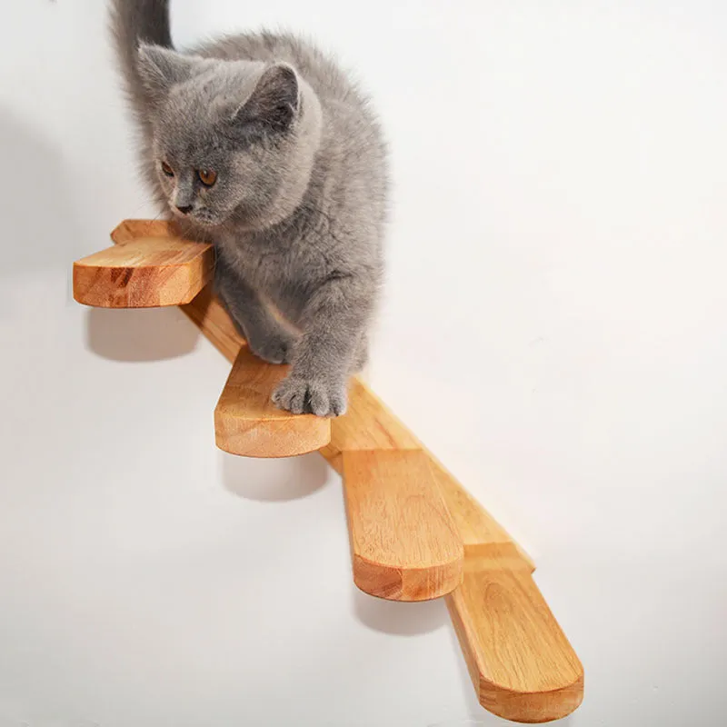 Wall-mounted solid wood cat stairs with 4 steps, left-to-right arrangement, on a white wall