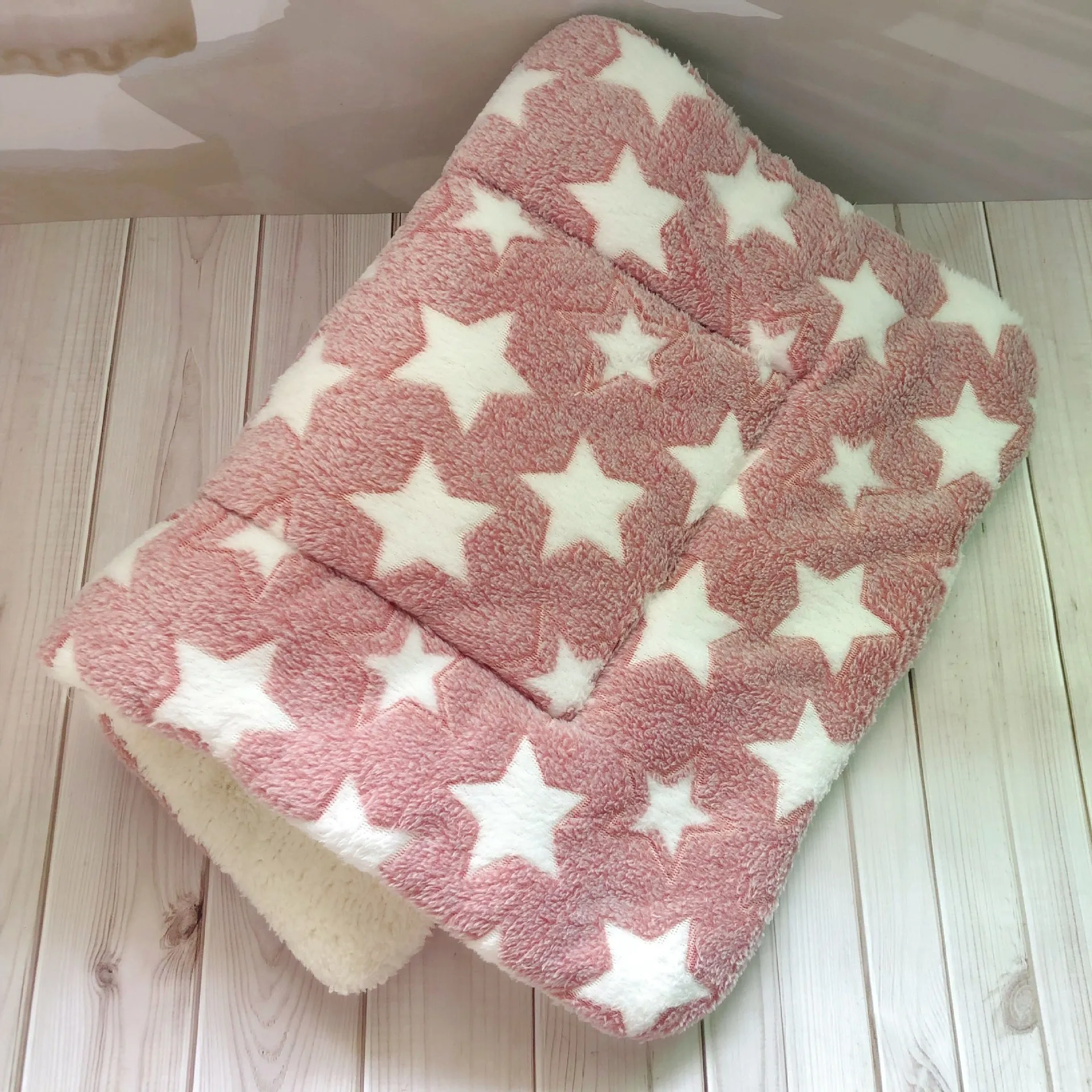 Thick flannel pet blanket in soft coral fleece for dogs cats on sofa