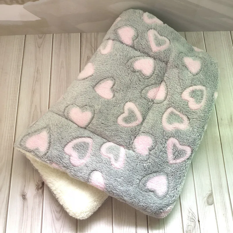 Thick flannel pet blanket in soft coral fleece for dogs cats on sofa