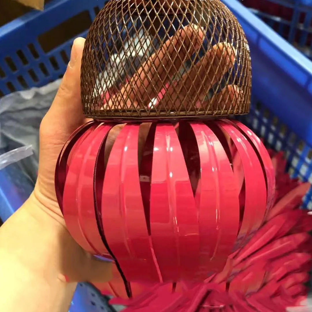 Garden petal shape wire bird feeder in red, 78cm long, hanging outdoors