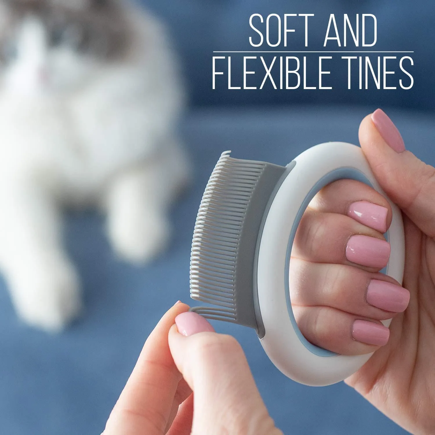 Blue plastic pet grooming comb for cats and dogs on a white background.