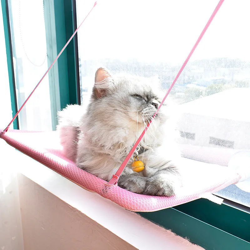 Black pet hammock with suction cups attached to a window, 53x32 cm, breathable mesh fabric