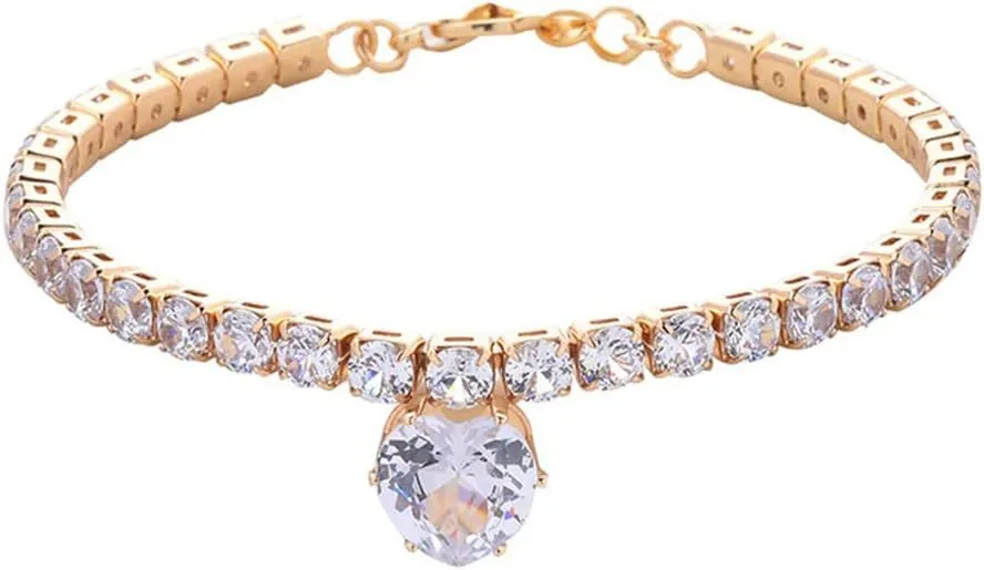 Shiny rhinestone heart-shaped collar for dog or cat in gold, on a size chart showing S, M, L measurements.