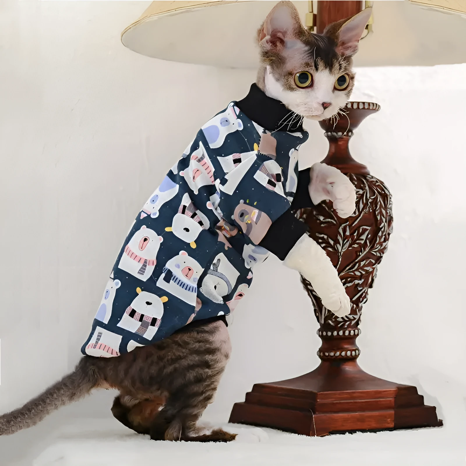 Cotton hairless cat bottoming clothing with lion print, two-legged design, on a light background