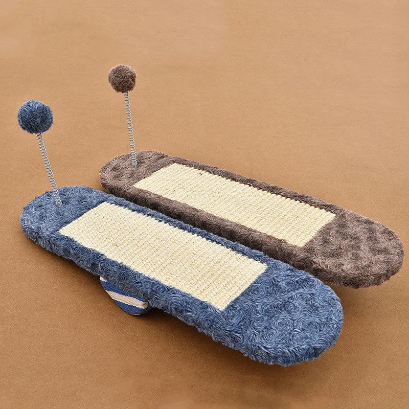 Royal blue cat seesaw toy with scratch board surface on a light background