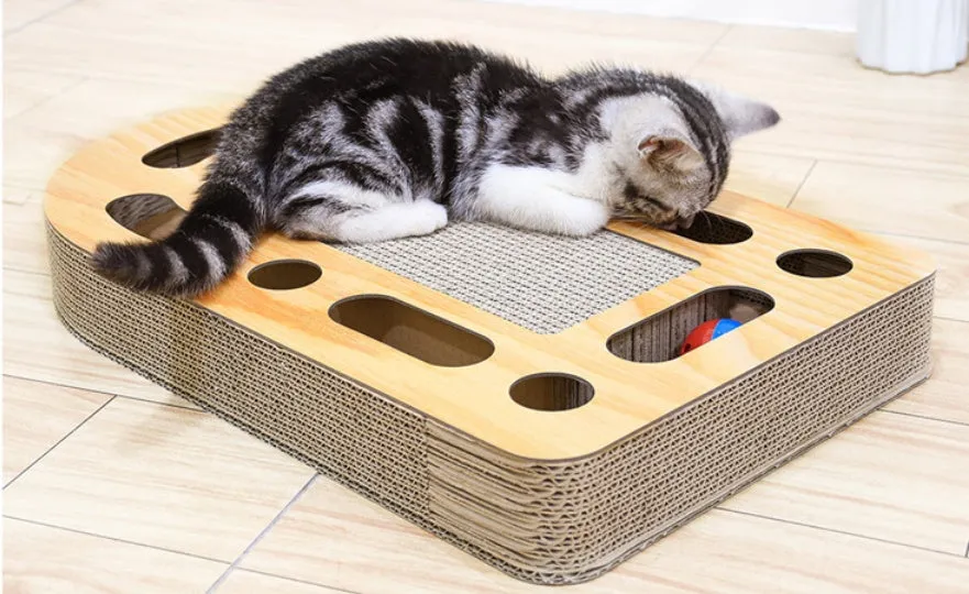 Brown corrugated cat scratch board with attached ball measuring 50.5x30.5x6cm