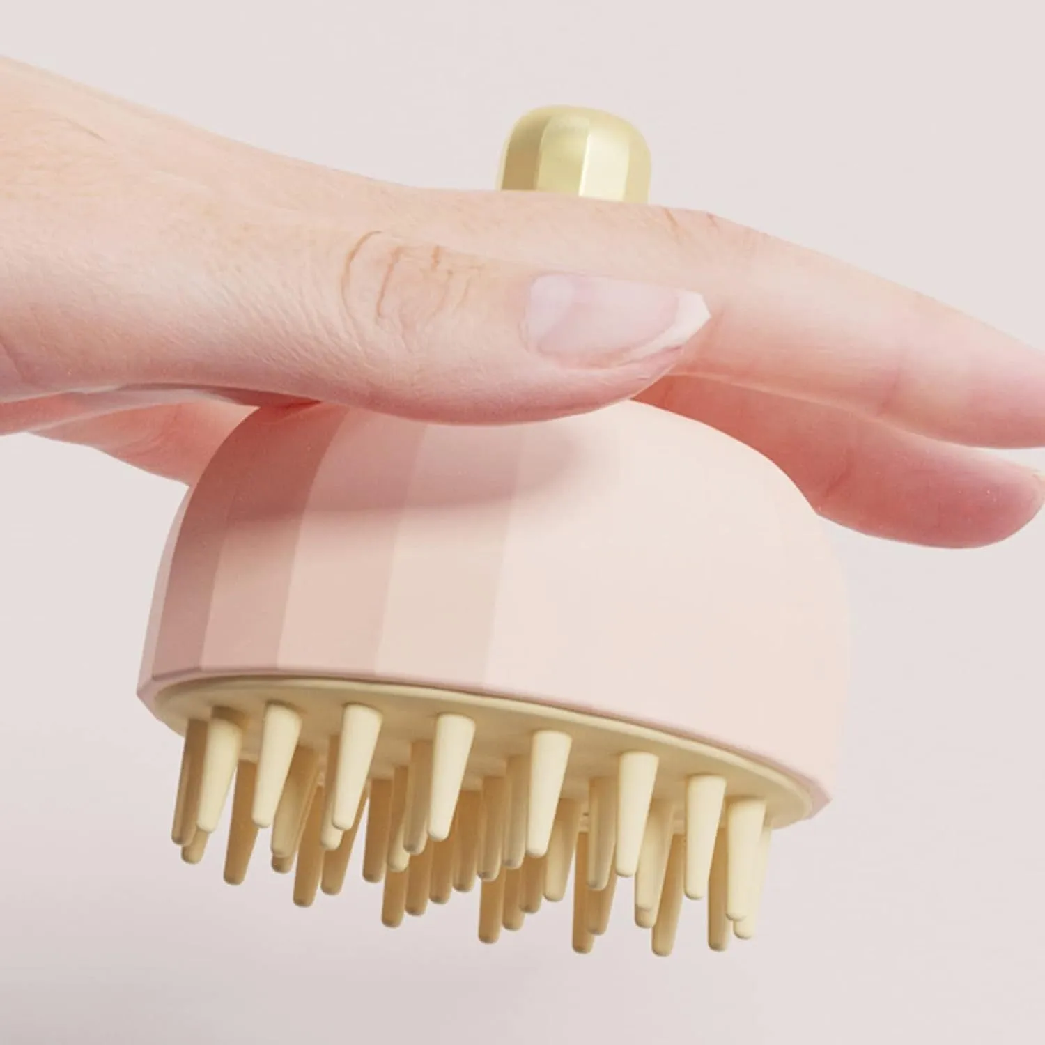 Four pet shampoo massage brushes in green, pink, and white colours with double-sided design and drain holes