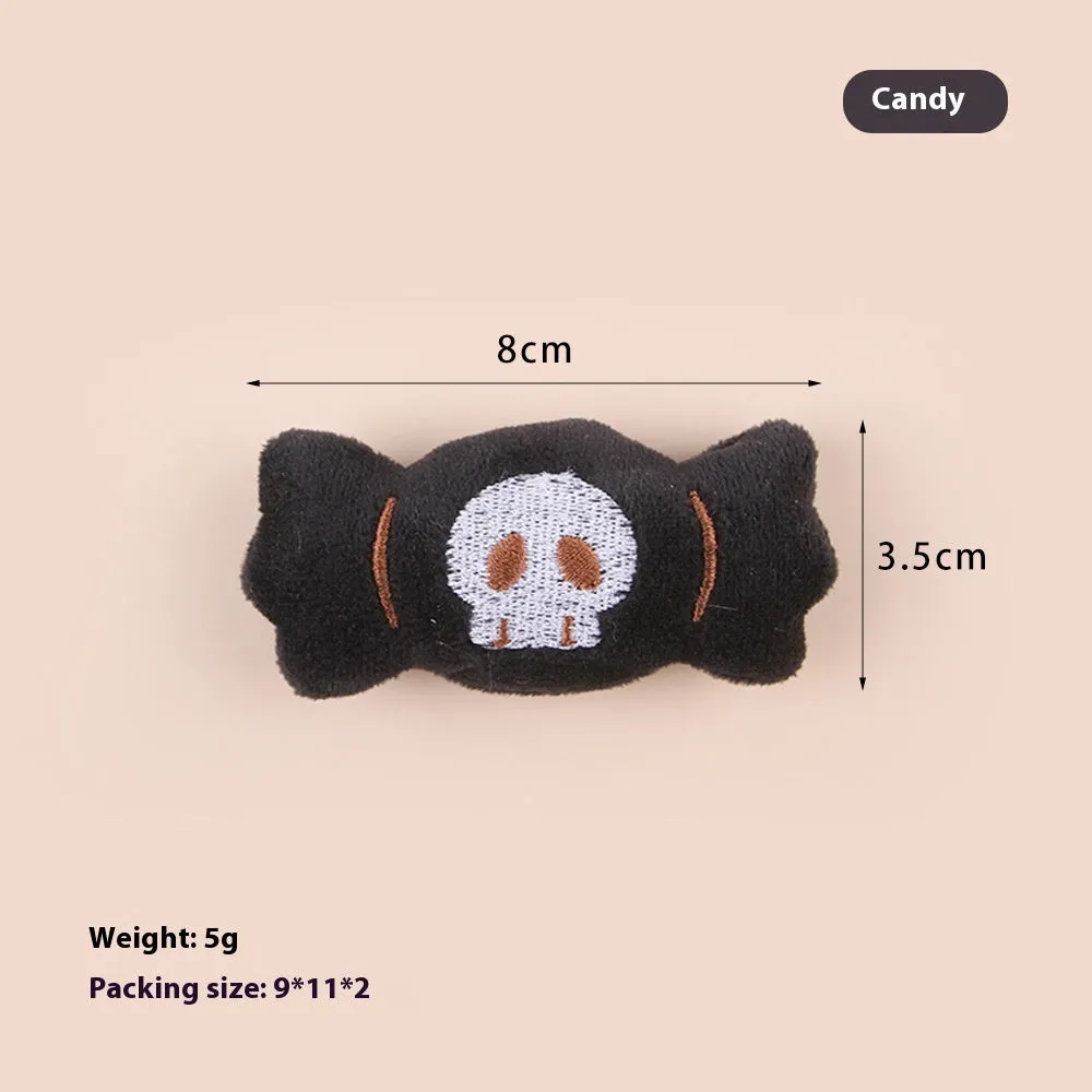 Plush cat teaser wand with candy-shaped attachment for interactive play