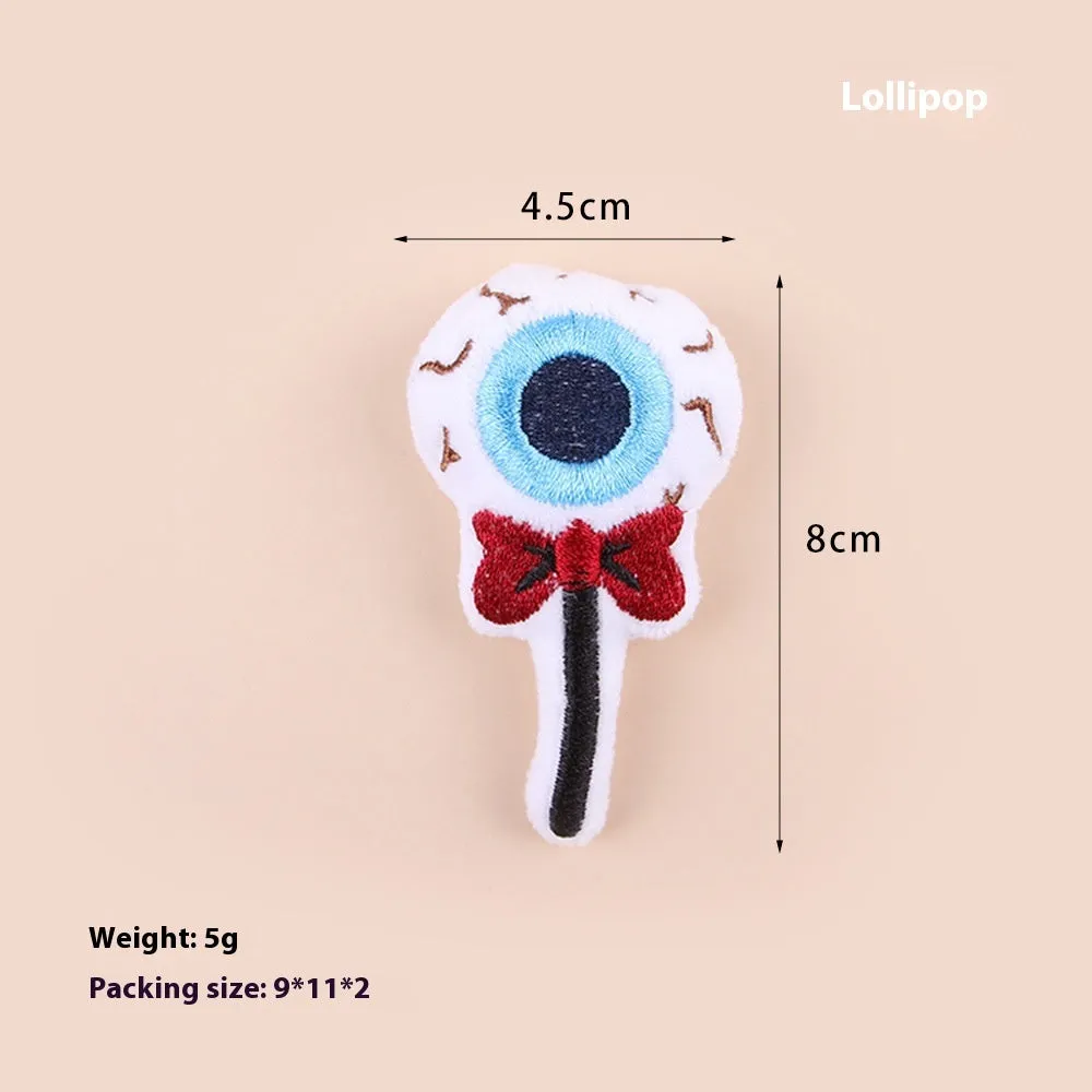 Plush cat teaser wand with candy-shaped attachment for interactive play