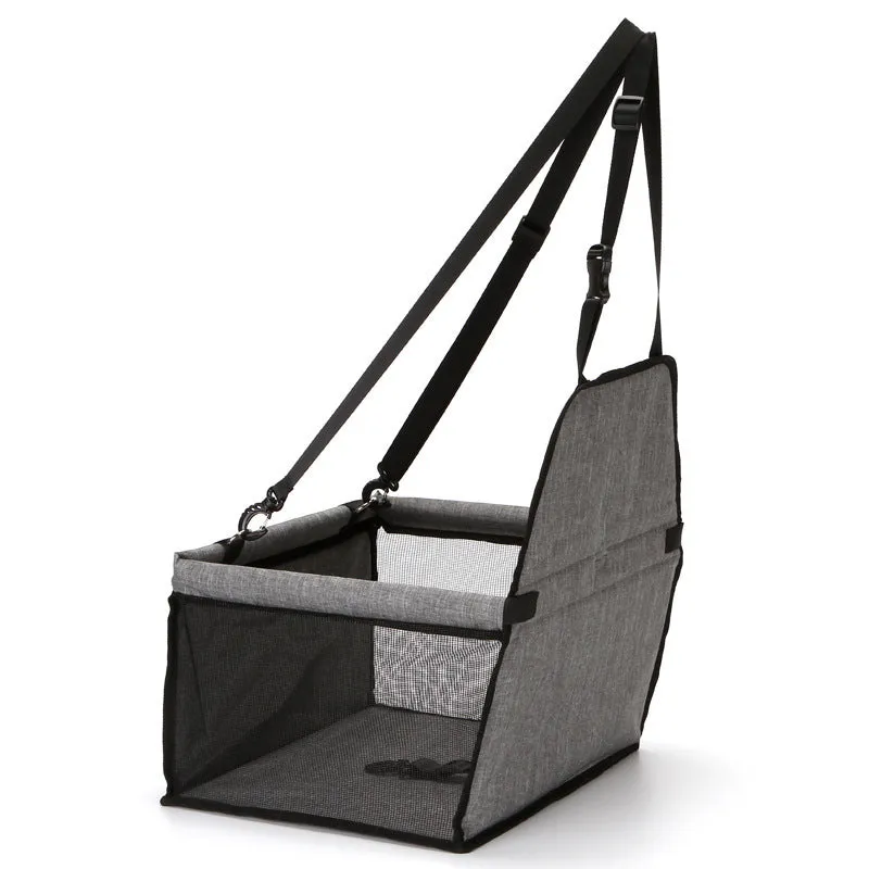Foldable pet safety seat car bag in black Oxford cloth on a car seat with safety tether visible