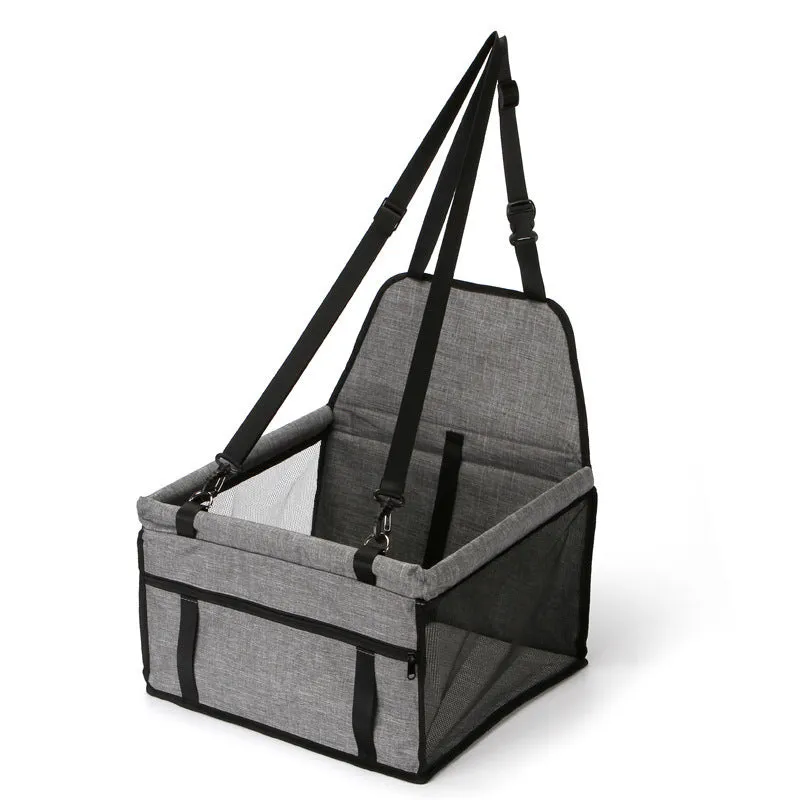 Foldable pet safety seat car bag in black Oxford cloth on a car seat with safety tether visible