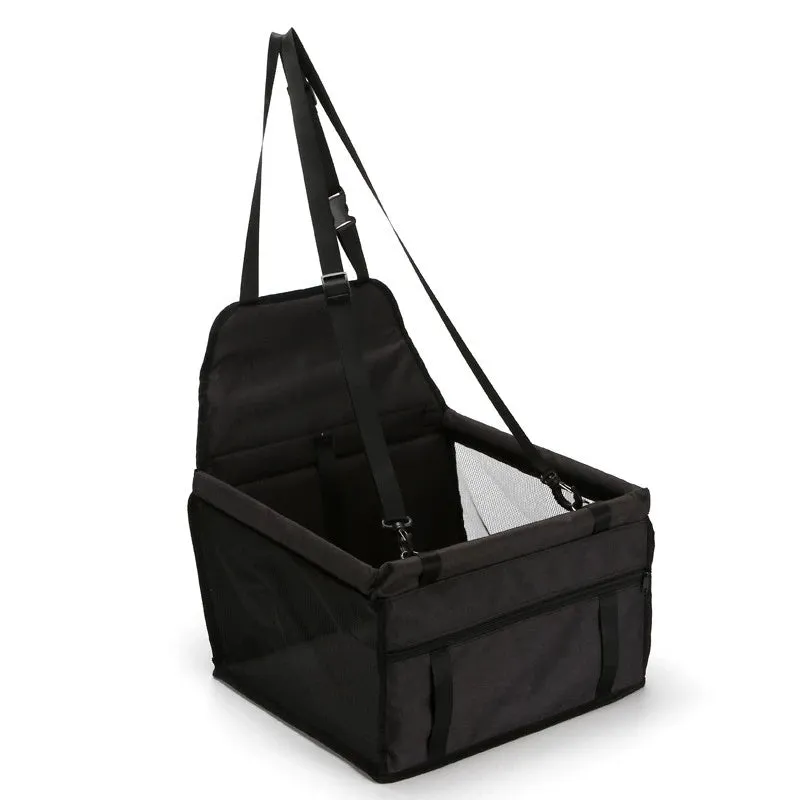 Foldable pet safety seat car bag in black Oxford cloth on a car seat with safety tether visible