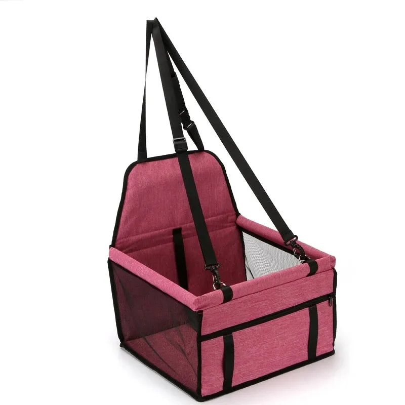 Foldable pet safety seat car bag in black Oxford cloth on a car seat with safety tether visible