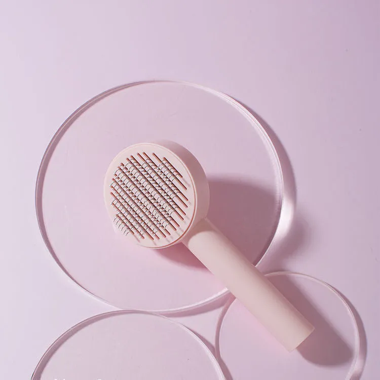 Pet cat comb hair brush for floating hair cleaner in white with one-click hair removal