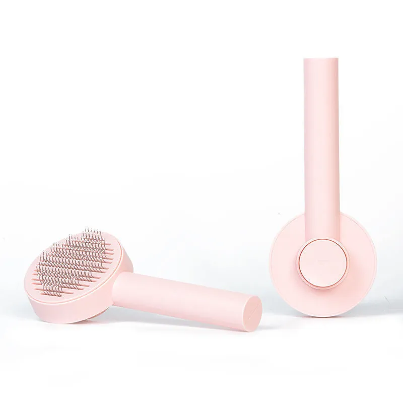 Pet cat comb hair brush for floating hair cleaner in white with one-click hair removal