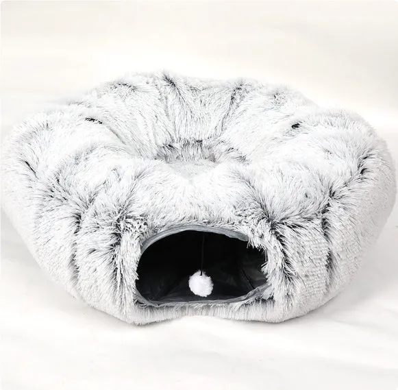 Closed cat tunnel nest 95cm made of long fluffy plush in rainbow colour on a wooden floor