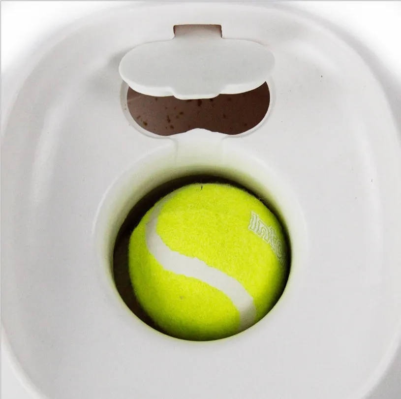 Dog tennis food award machine interactive treat dispenser with tennis ball, ABS plastic, 16x16x20cm size