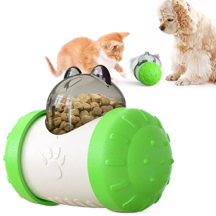 Interactive treat dispensing dog toy in green, self-standing tumbler design for slow feeding, food-grade ABS material