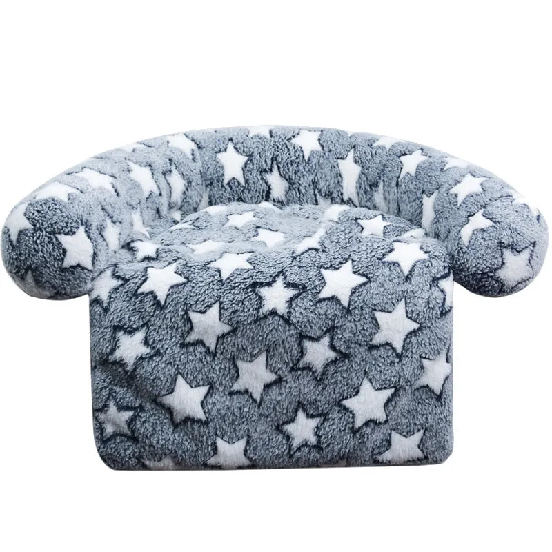 Plush kennel sofa blanket in orange star moon colour on a light background