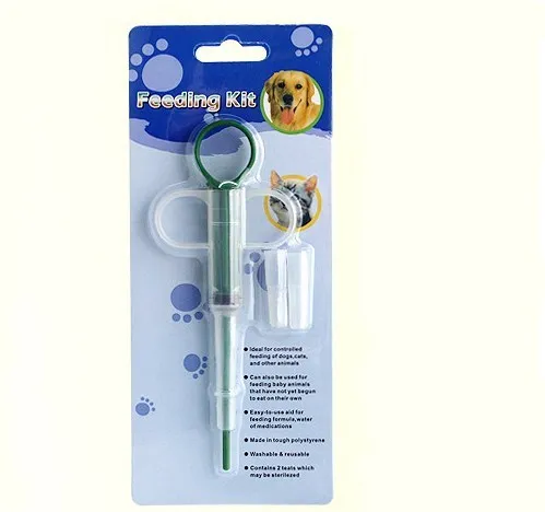Red and blue pet medicine pills feeder device 15cm long with plastic and silicone construction