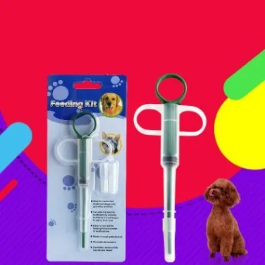 Red and blue pet medicine pills feeder device 15cm long with plastic and silicone construction