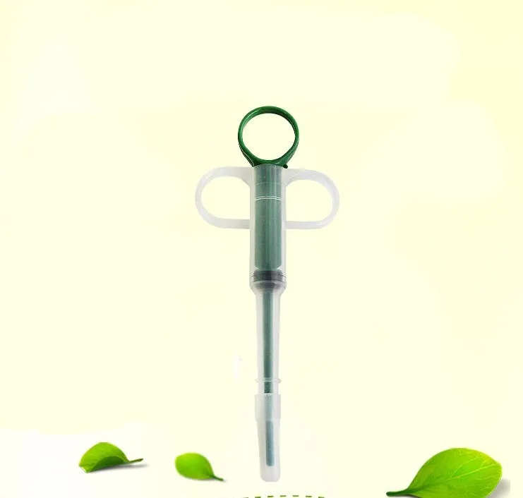 Red and blue pet medicine pills feeder device 15cm long with plastic and silicone construction