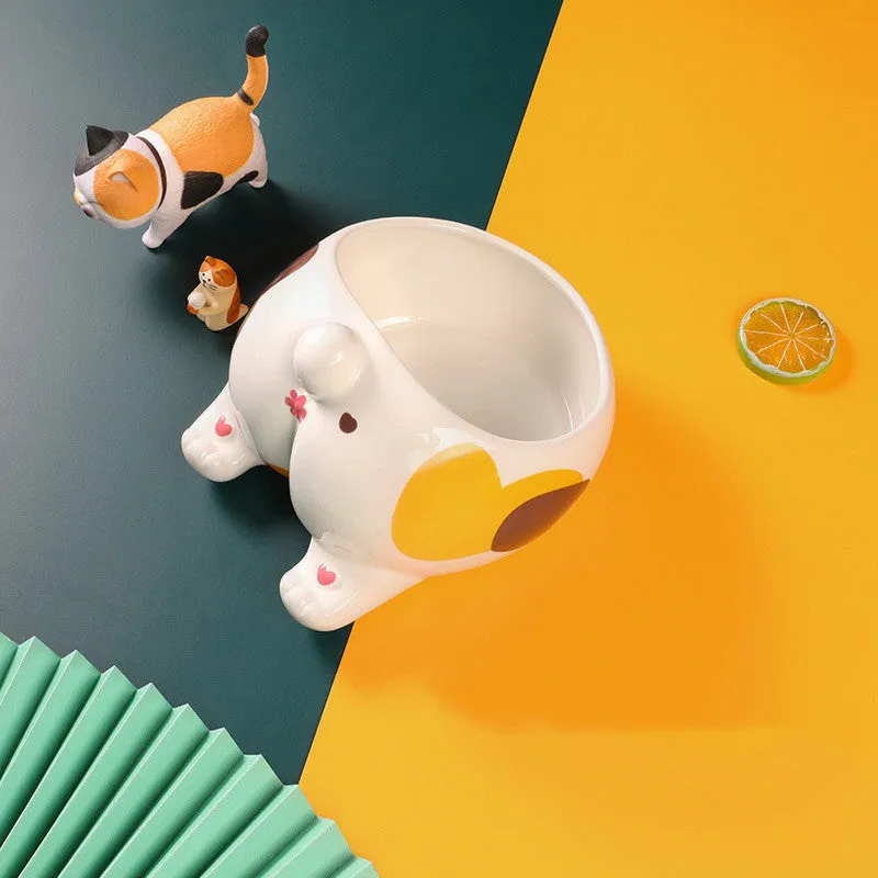 Ceramic pet bowl with inclined mouth design in a cute cat butt shape, suitable for cat or dog food and water