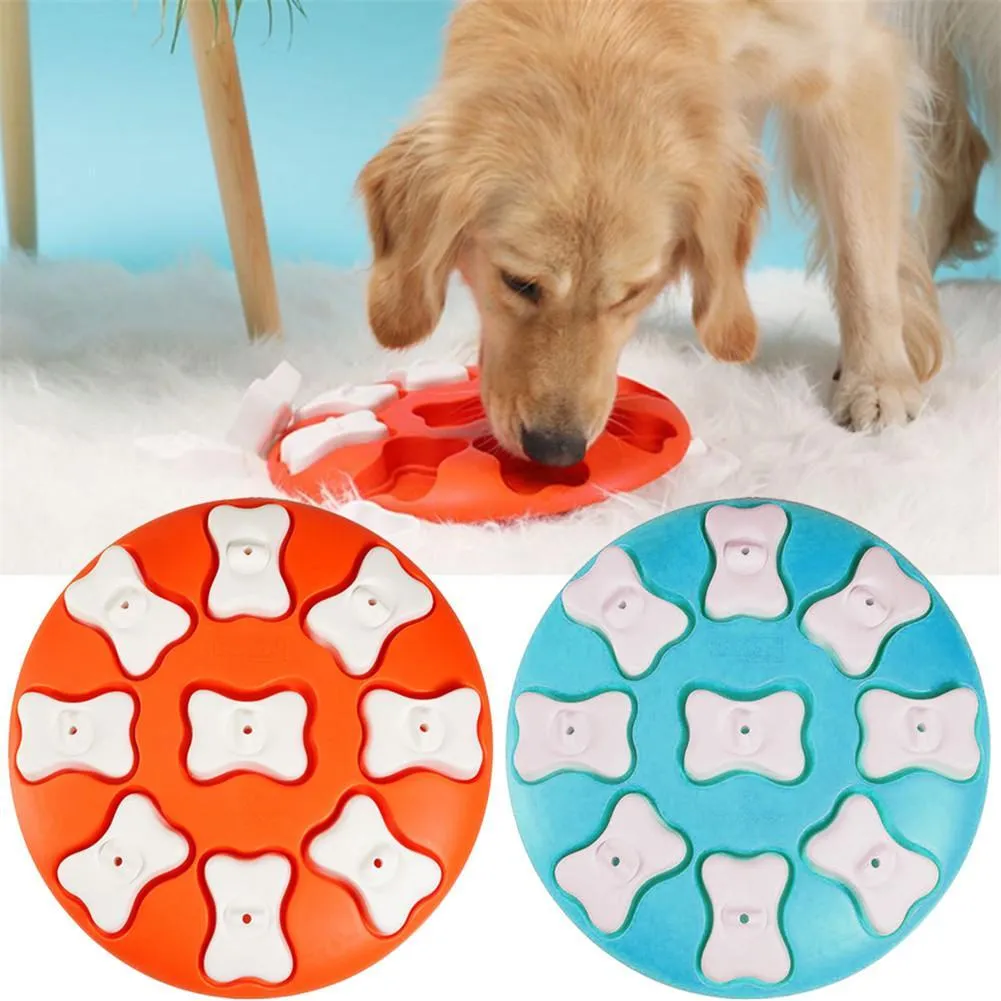Blue interactive dog puzzle toy with nine compartments and bone covers on a light background