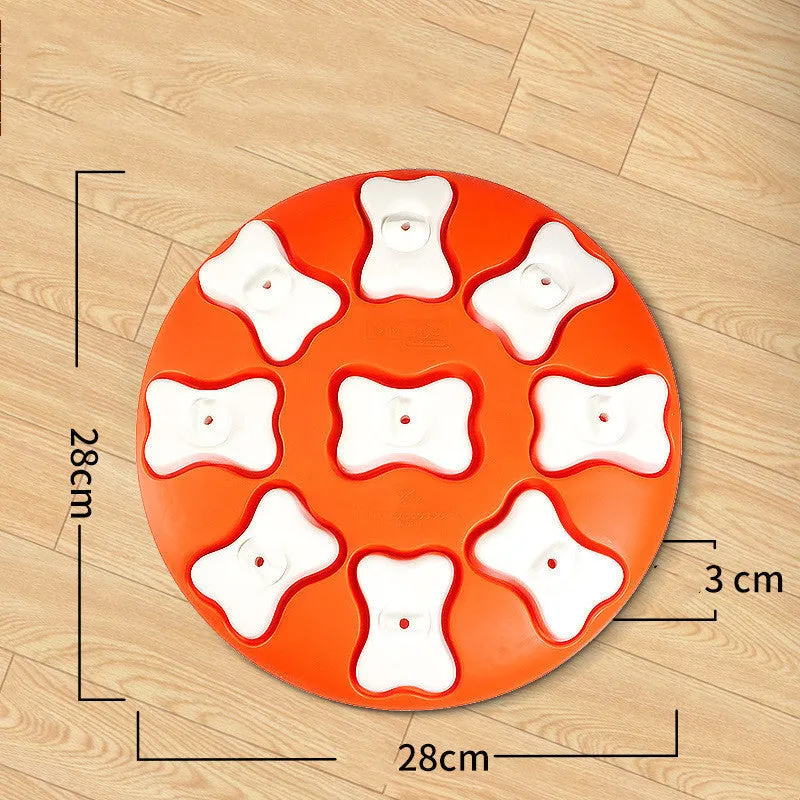 Blue interactive dog puzzle toy with nine compartments and bone covers on a light background