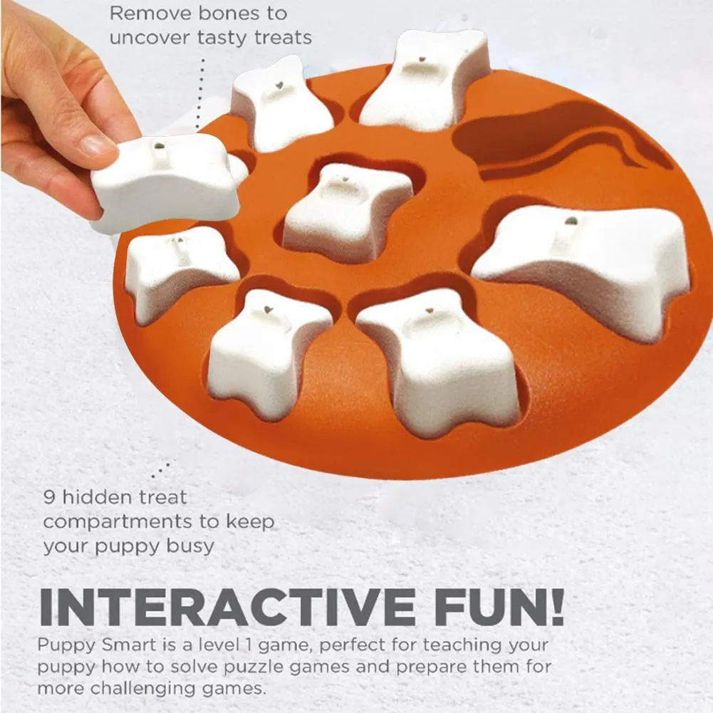 Blue interactive dog puzzle toy with nine compartments and bone covers on a light background