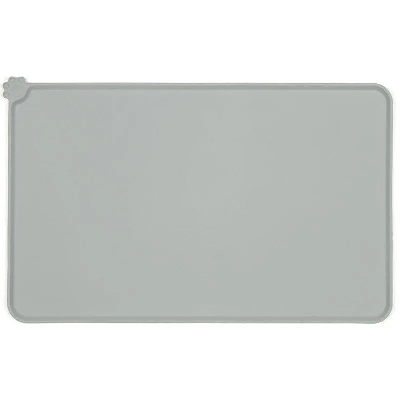 Black silicone dog food mat measuring 47 by 30 centimetres with non-slip surface and raised edges.
