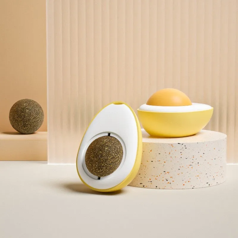Interactive catnip ball toy with egg design mounted on wall for feline play