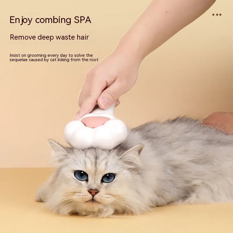 White plastic pet comb with one-click hair removal and massage feature for cat grooming