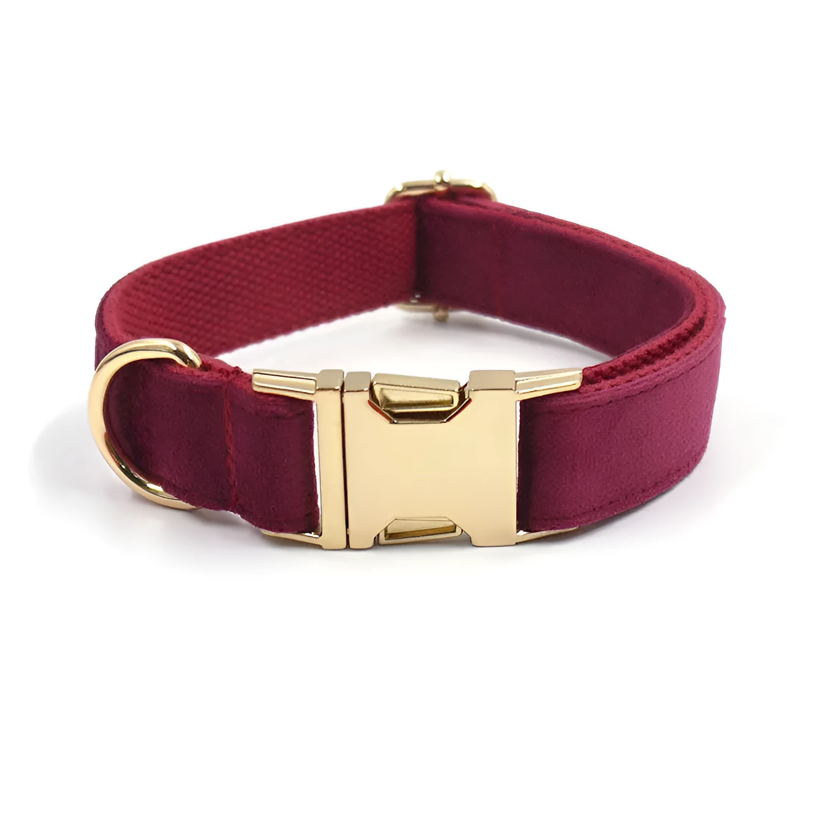 Burgundy velvet dog collar set with bow tie and leash on a wooden floor