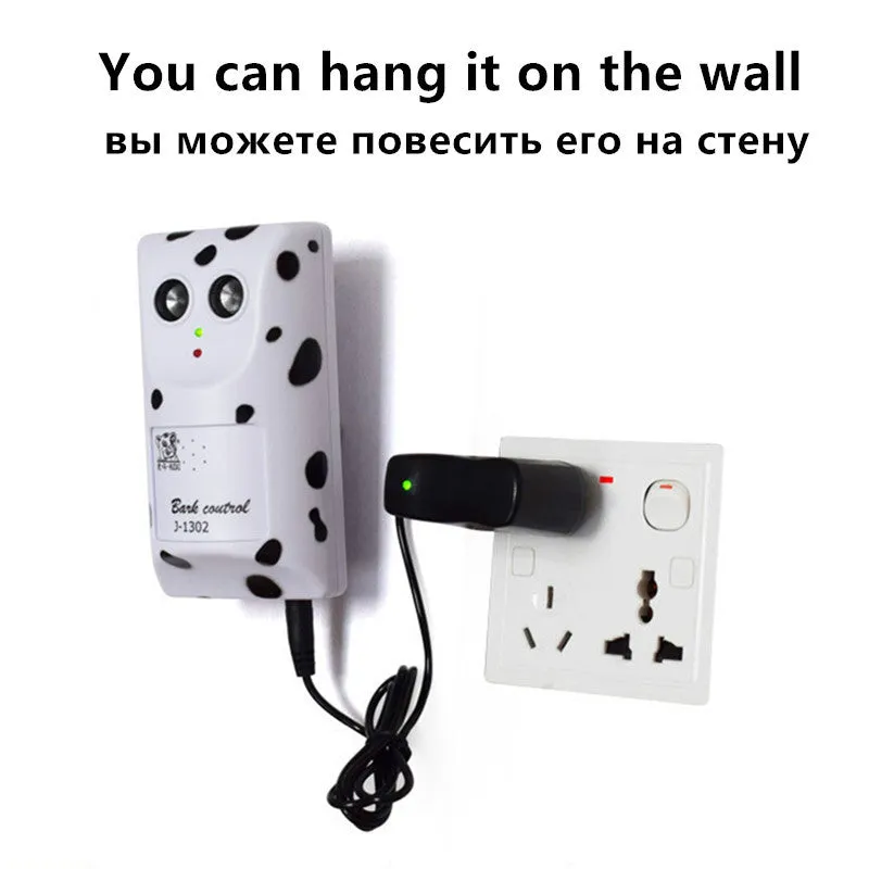 White anti-barking ultrasonic dog repeller mounted on a wall with rotary holder, 7x13x5cm