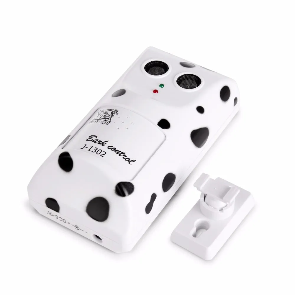 White anti-barking ultrasonic dog repeller mounted on a wall with rotary holder, 7x13x5cm